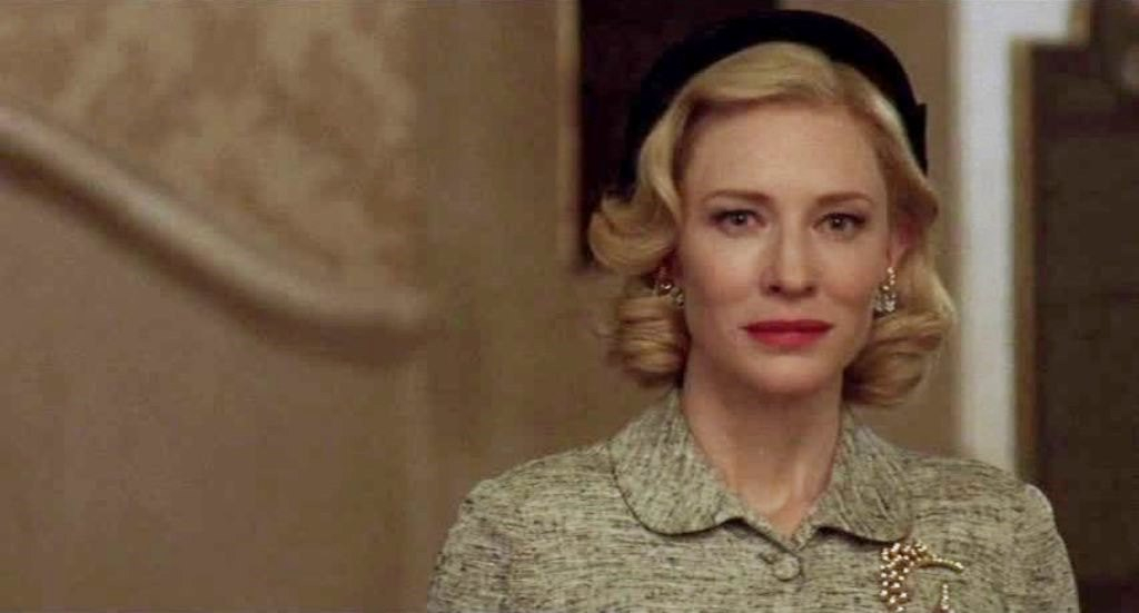 Carol looks directly into the camera - conveying the lesbian gaze
